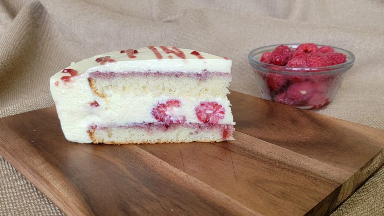 Frozen White Chocolate Mousse Cake with Raspberry Sauce